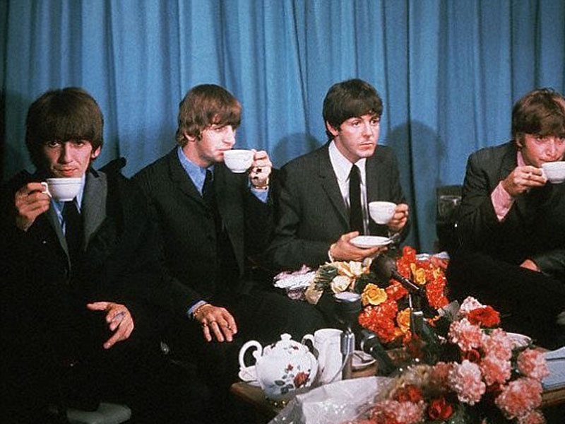 The Beatles drinking tea