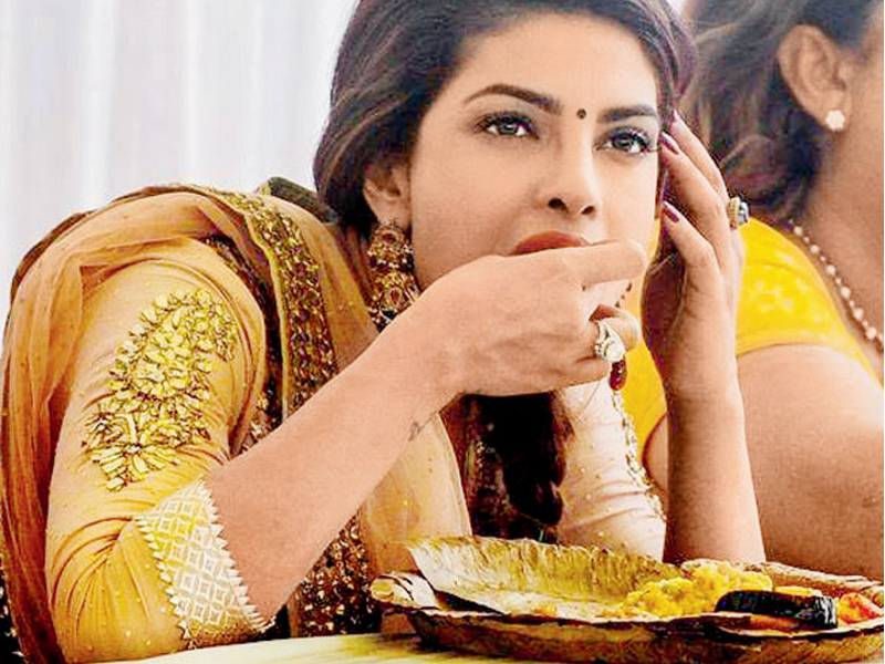 priyanka chopra eating ladoos
