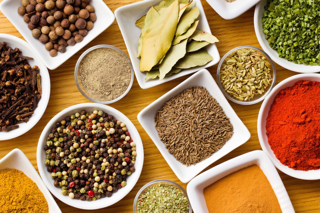 bigstock-Various-spices-and-herbs-on-wo-42576604