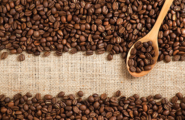 Coffee beans lose moisture in the roasting process. Four ounces of green coffee beans roasts to about 3.2 ounces.