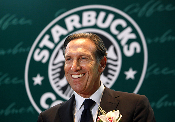 Starbucks Corp. CEO Howard Schultz smiles during a ceremony marking the 10th anniversary of the first open Starbucks coffee shop in Hong Kong Thursday, April 15, 2010.  (AP Photo/Kin Cheung)