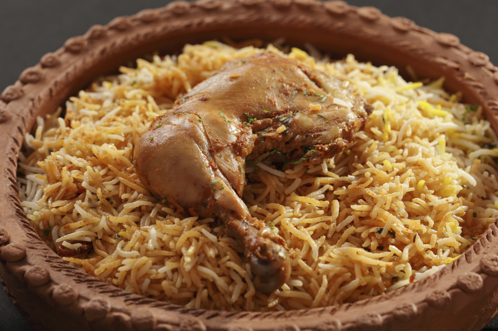 Hyderabadi Biryani - is perhaps the most well-known Non-Vegetarian culinary delights from the famous Hyderabad Cuisine. It is a traditional dish made using Basmati rice, goat meat and various other exotic spices.