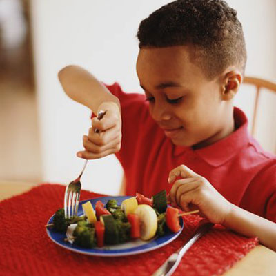 Children eating Vegetables