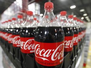 Bottles of Coca-Cola are seen in a warehouse at the Swire Coca-Cola facility in Draper, Utah March 9, 2011.  REUTERS/George Frey  (UNITED STATES - Tags: BUSINESS)