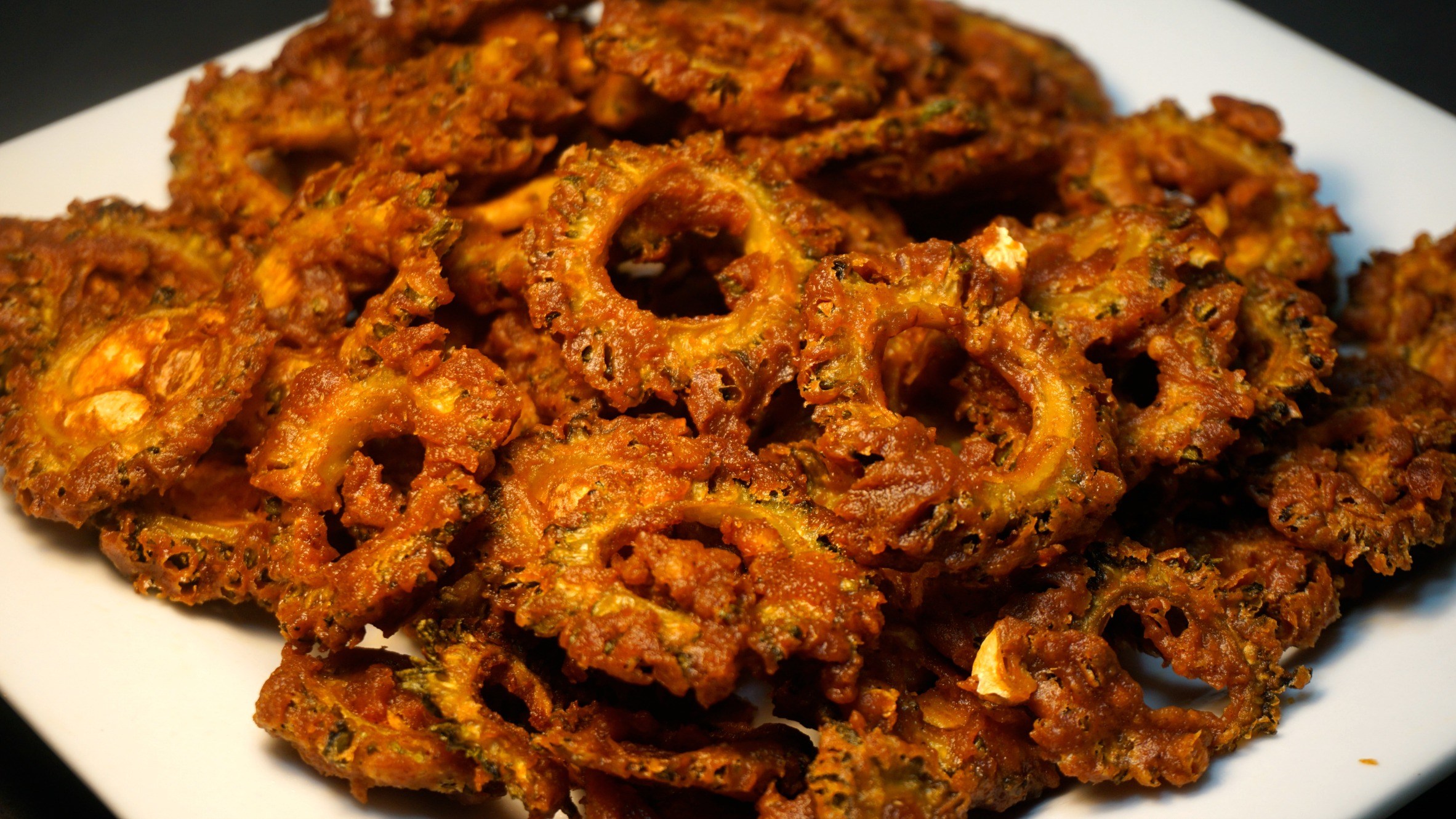 Homemade crispy Bitter Gourd Chips ( Pavakkai / Karela Chips)